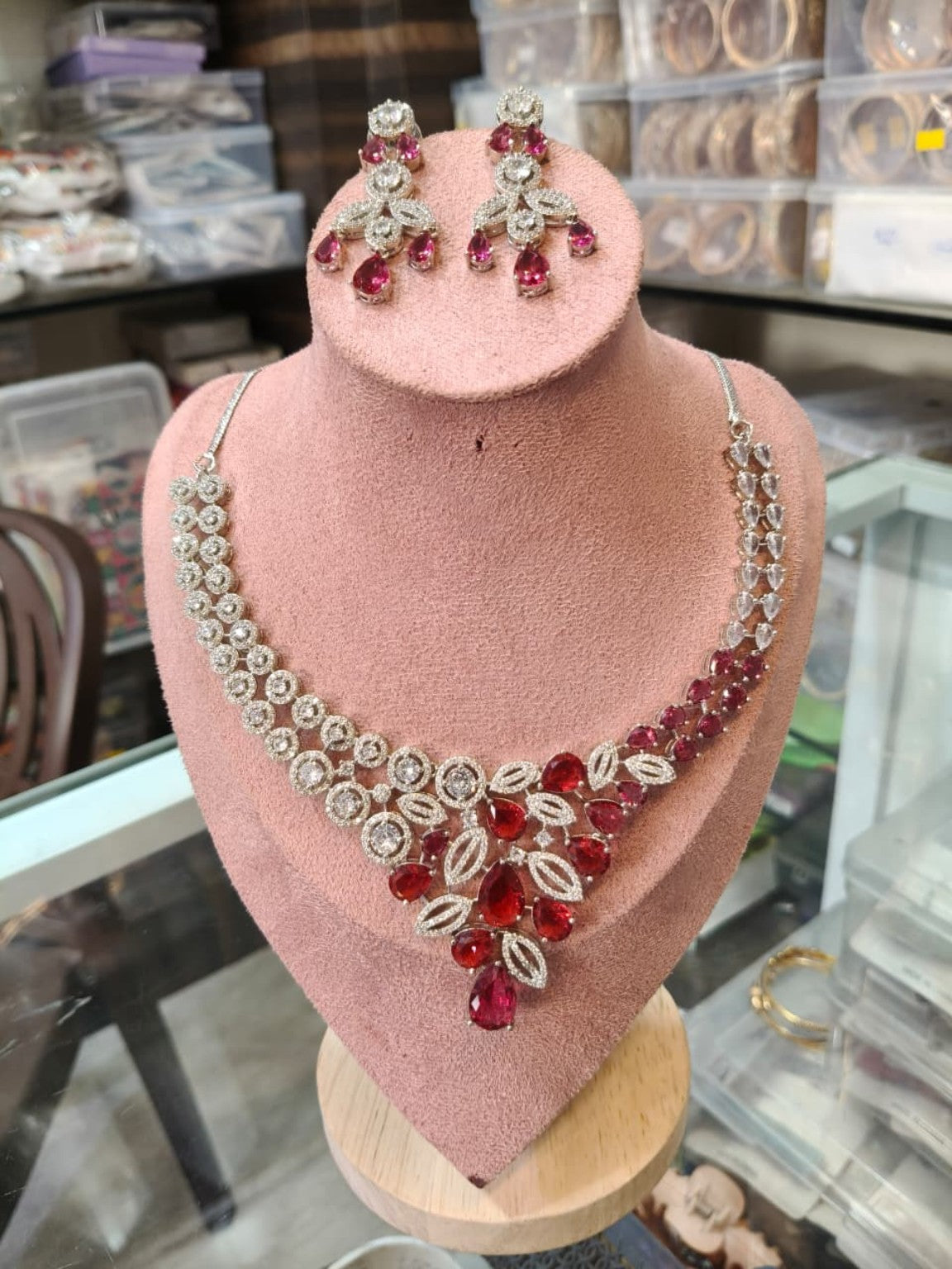 Deep red teardrop crystal necklace with matching earrings
