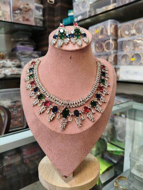Emerald green teardrop crystal necklace with matching earrings