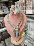 Silver-tone pearl and crystal necklace with matching chandelier earrings